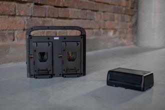 Karikues katër-kanalësh për kamera Newell BP-4CH, për bateri V-mount, me dalje DC